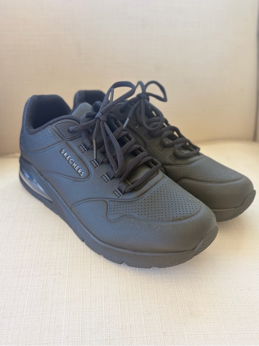 Skechers UNO women’s All-Black Lace-Up Sneakers